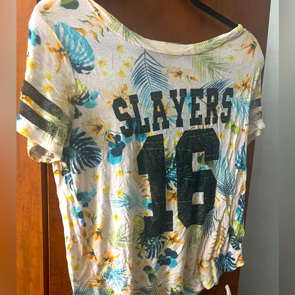 Medium floral top with 16 on it